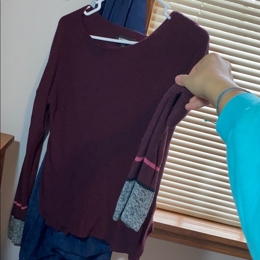 Maroon sweater with stripes on sleeves